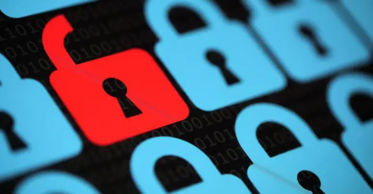 A grid of blue padlock icons with one red unlocked padlock icon in the center, symbolizing a security breach or vulnerability in storage facility management systems.